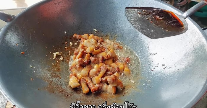 Add 1 tablespoon of light soy sauce and stir-fry to combine.