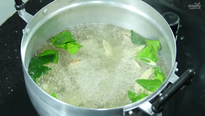 Add duck and offal to the boiling water.