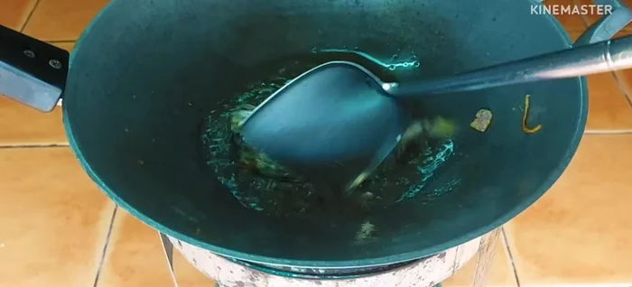 Fry the mackerel until cooked through. Remove and set aside to drain.