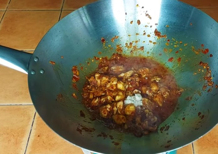 Season with seasoning powder, MSG (optional), sugar, and soy sauce. Stir-fry until well combined.