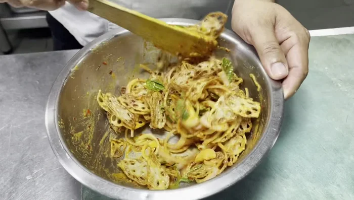 Serve immediately. This salad is best enjoyed within 3-4 minutes of preparation to maintain its crispiness.