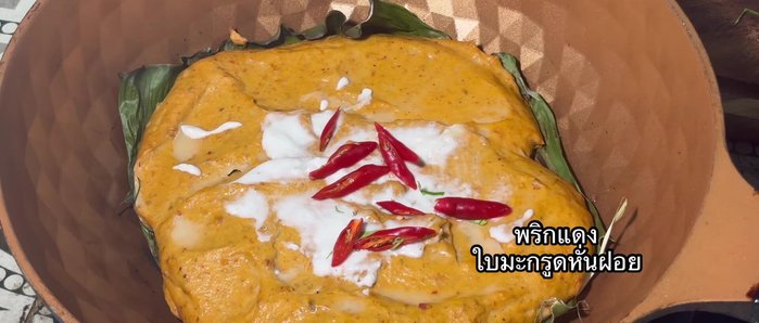 Add coconut milk, red chili, and shredded kaffir lime leaves; cook for another 5 minutes. (198.159)