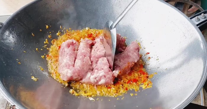 Add the minced pork and stir-fry until fragrant and cooked.