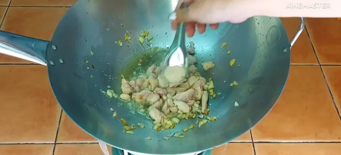 Season the cooked chicken with seasoning powder, sugar, light soy sauce, and oil. Stir-fry until well blended.