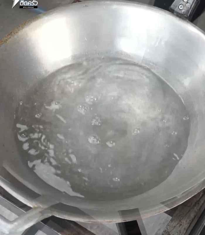 Boil the pork ribs in water until they float, skimming off any foam.