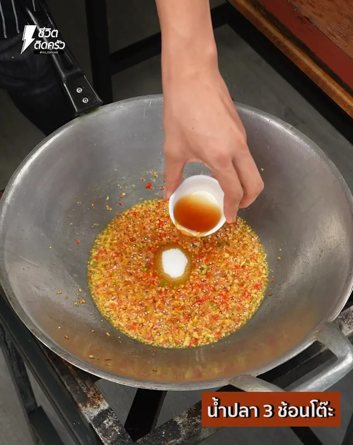 Season with sugar, fish sauce, and ground pepper. Mix well.