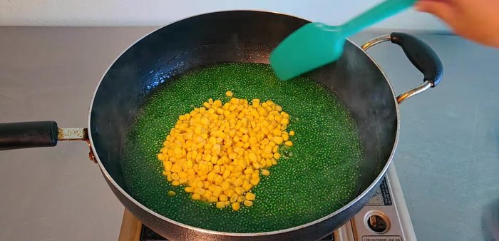 Add corn (500 grams or 2 ears of cooked corn) and stir for 1-2 minutes. Turn off heat and let it cool slightly.
