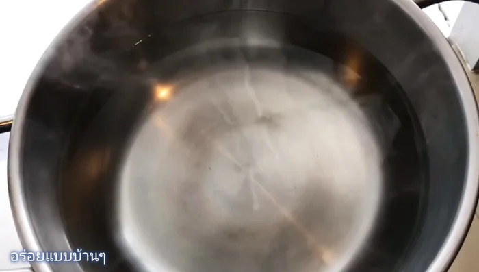 Carefully add 4 eggs to the pot.