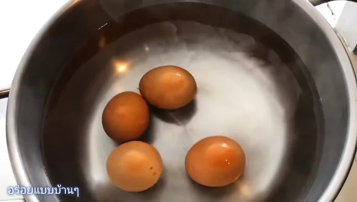 Set a timer for 16 minutes and let the eggs simmer.