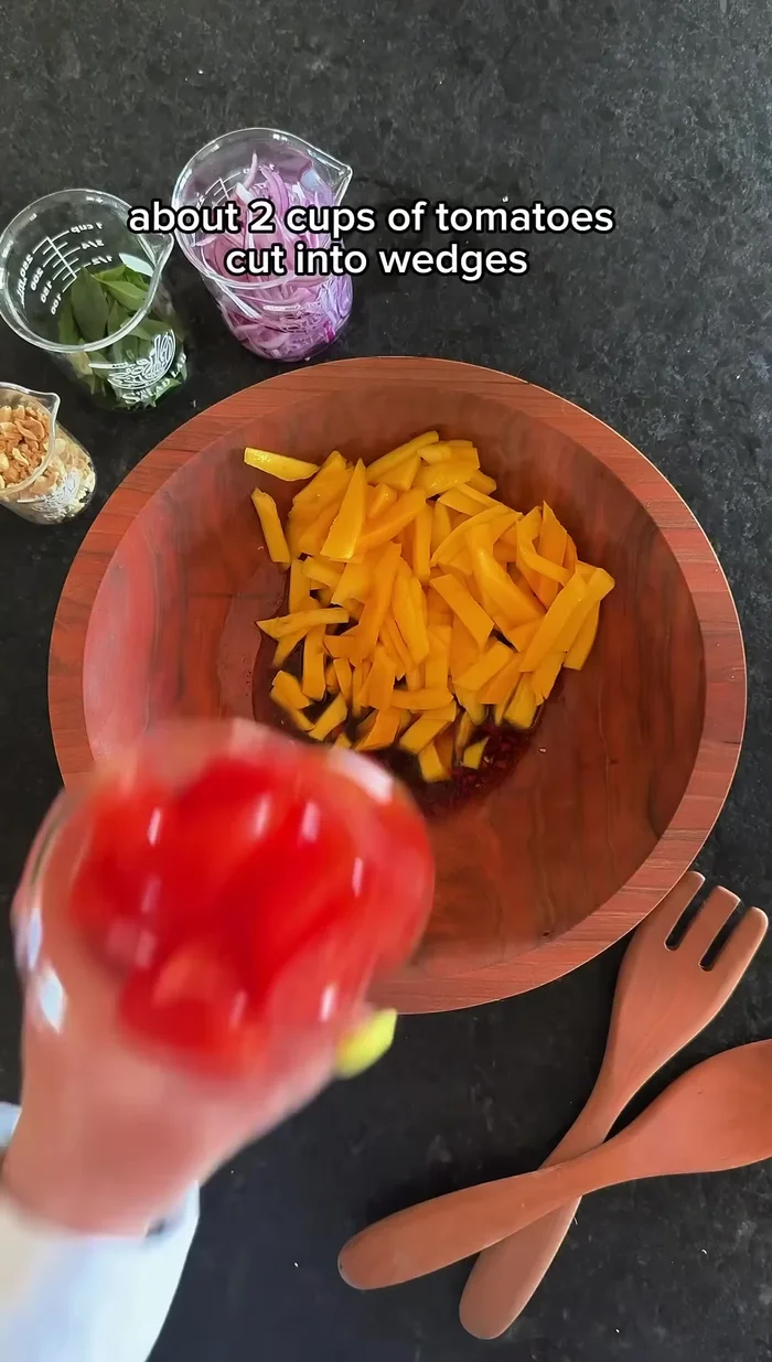 Cut the tomatoes into wedges.