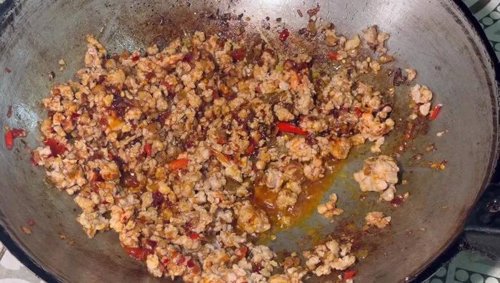 Add the onions and continue to stir-fry.