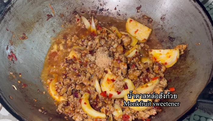 Season with palm sugar and oyster sauce (optional). Stir-fry until well blended.