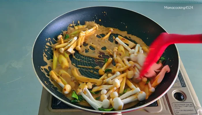 Add mushrooms and stir-fry until cooked (about 1-2 minutes).