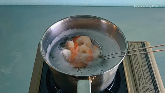 Boil shrimp for 2-3 minutes until cooked.