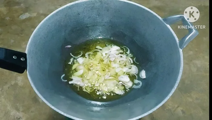 Fry shallots until golden and crispy. Set aside to drain.
