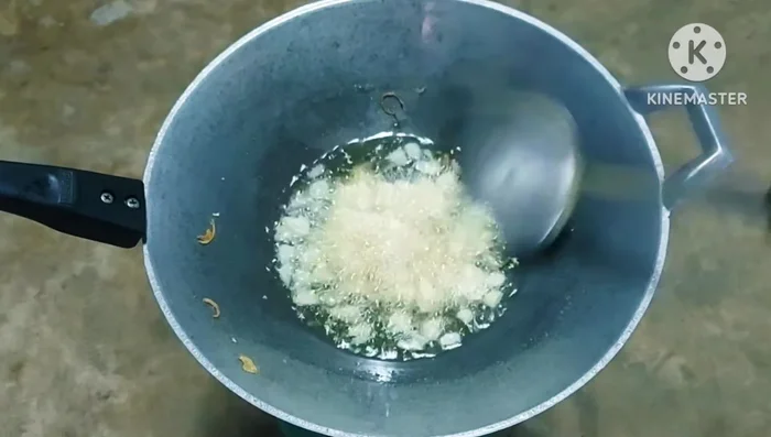 Fry garlic until golden and crispy. Avoid over-frying to prevent bitterness.