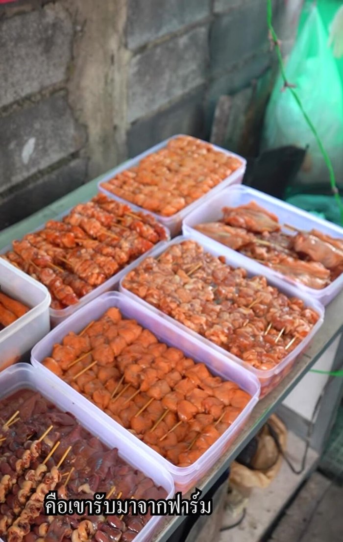 Marinate the chicken: The exact marinade recipe isn't specified, but it's implied to be a family recipe that's been refined over time. The taste is described as intense and varies slightly depending on the chicken part (bones, liver, skin).
