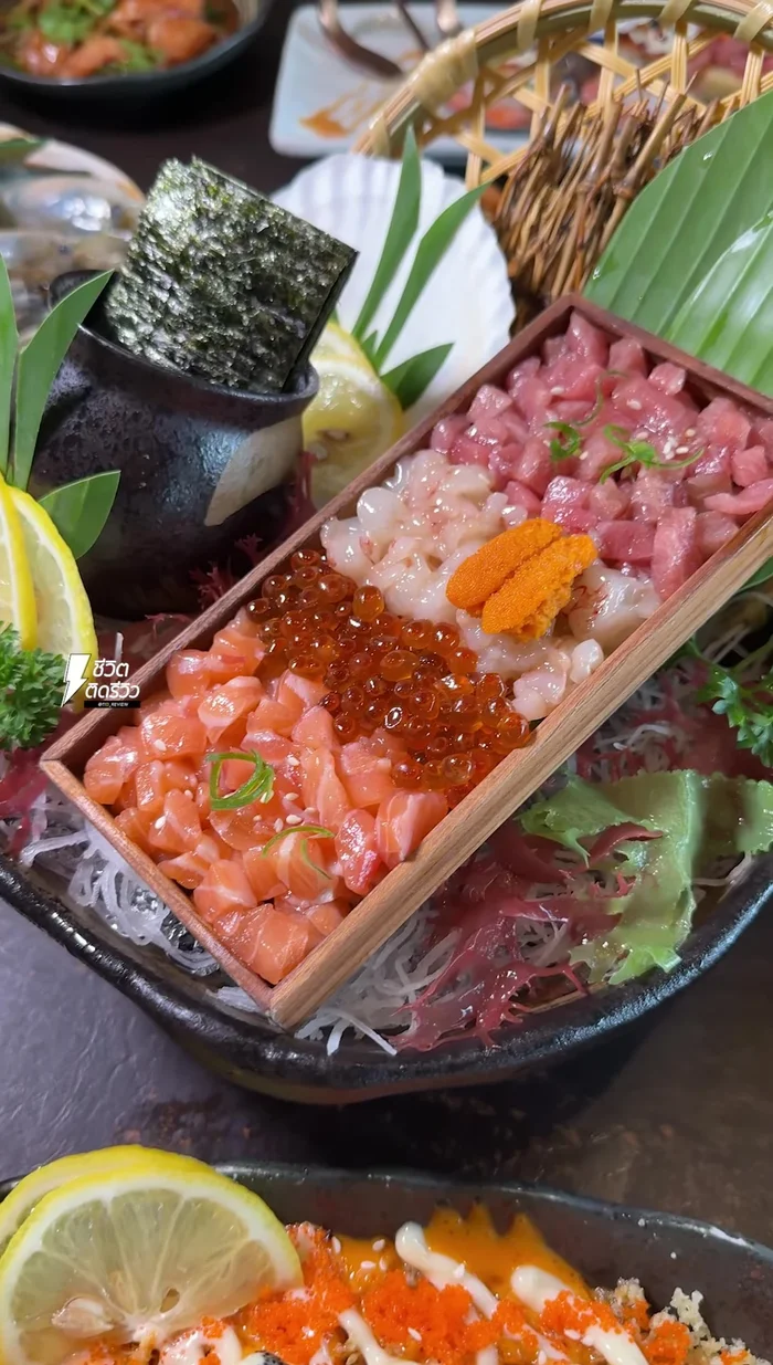 Prepare another premium seafood set: Include Botan shrimp, Ikura, Uni, and Toro. Serve in bite-sized pieces.