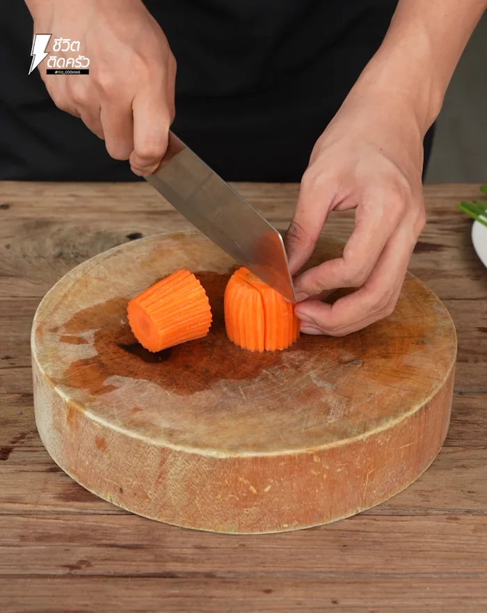 Peel and cut carrots into 2-inch sticks.