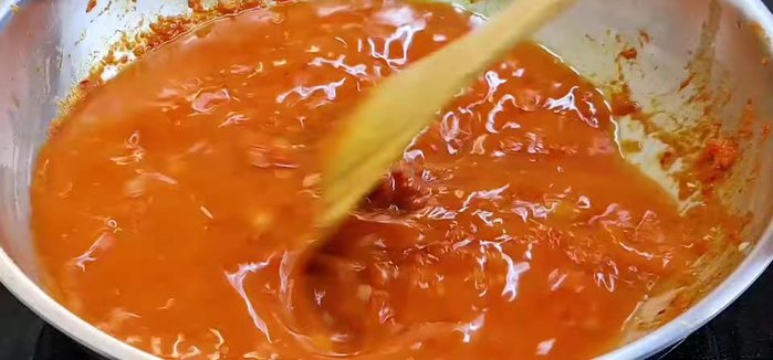 Add water and chilies: Add the remaining water and stir. Submerge the crabs in the gravy. Bring to a rolling boil for 3-4 minutes.