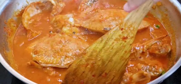 Cook the crabs: Stir crabs to distribute heat. Cover and simmer for another 3 minutes until cooked through.