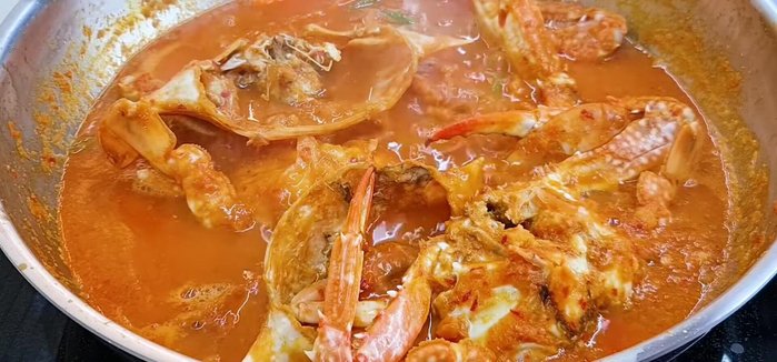 Season and thicken: Taste and add more salt if needed. Remove crabs and set aside. Thicken the gravy by stirring in the tapioca flour mix and eggs.