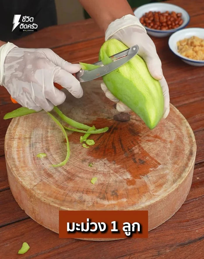 Peel and slice mangoes, then cut crosswise into strips. Set aside.
