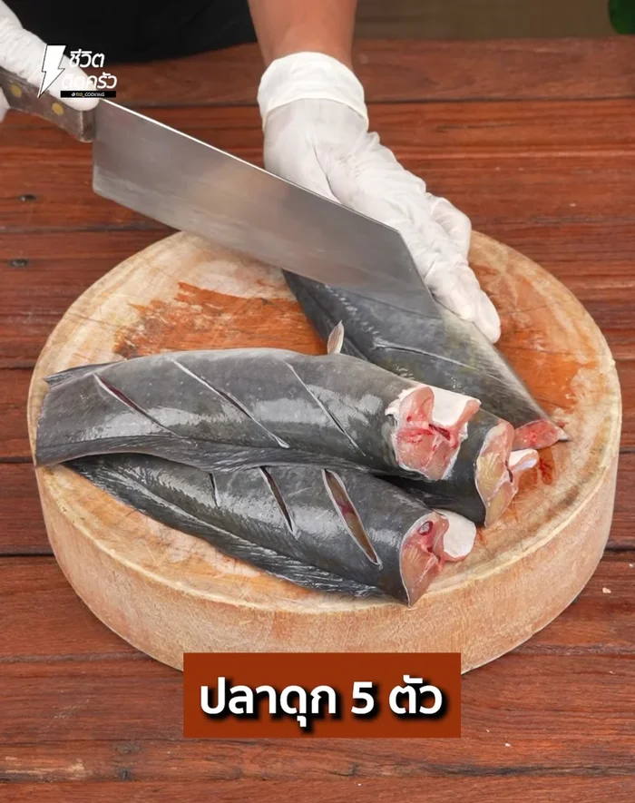 Clean the catfish. Apply salt to the fish to enhance flavor and help it cook well.