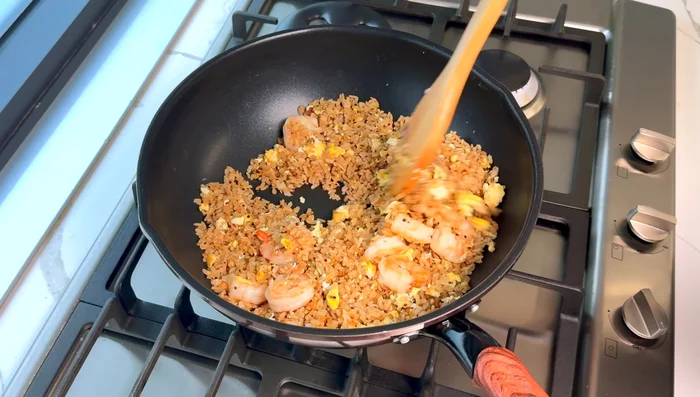 Add fish sauce and shallots; stir-fry until well combined.