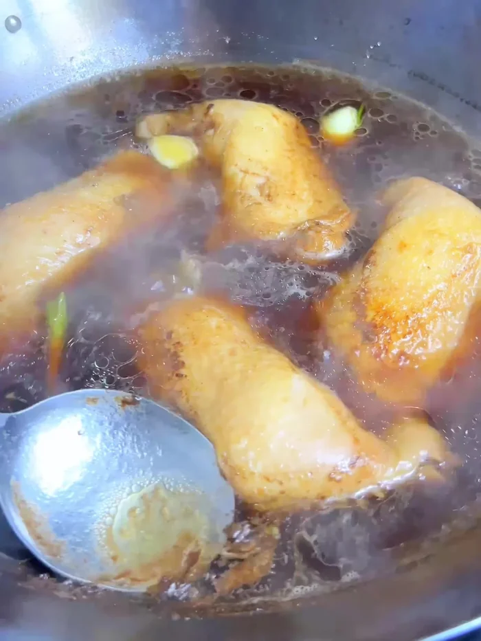 Simmer for another 15 minutes, basting with sauce.