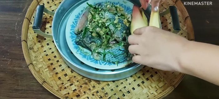 Steam the fish and vegetables: Place the seasoned tilapia and prepared vegetables in the steamer. Steam until cooked through.
