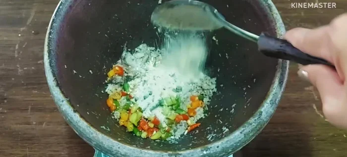 Add sliced chilies and roasted rice.