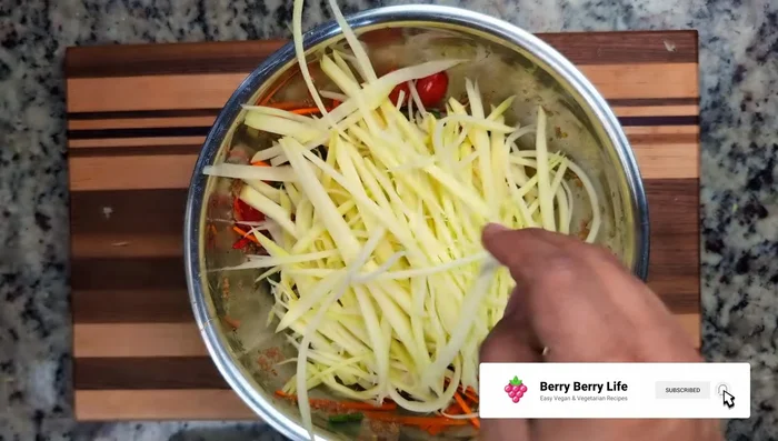 Add papaya gradually, mixing and slightly bruising until wilted. Refrigerate for about 2 hours.