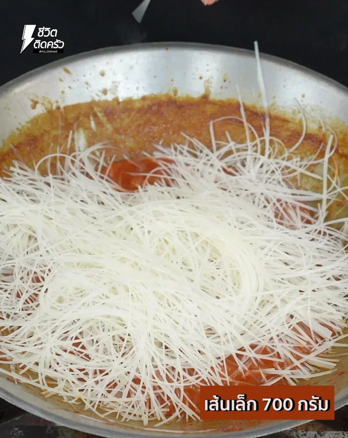 Add the thin noodles to the sauce and stir-fry until the noodles absorb the sauce. Add plain water if needed to prevent sticking.