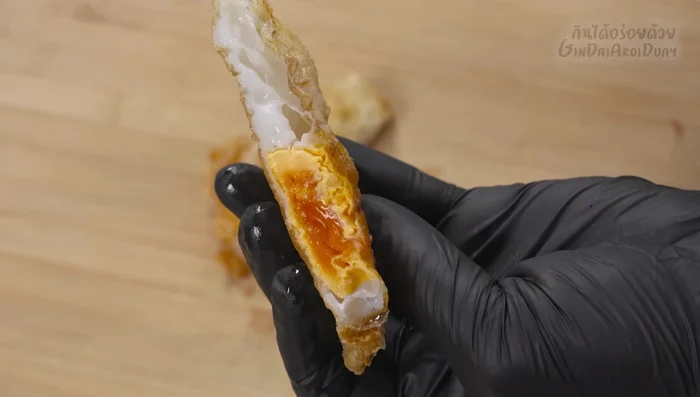 Cut the fried eggs into desired pieces (halves or quarters).
