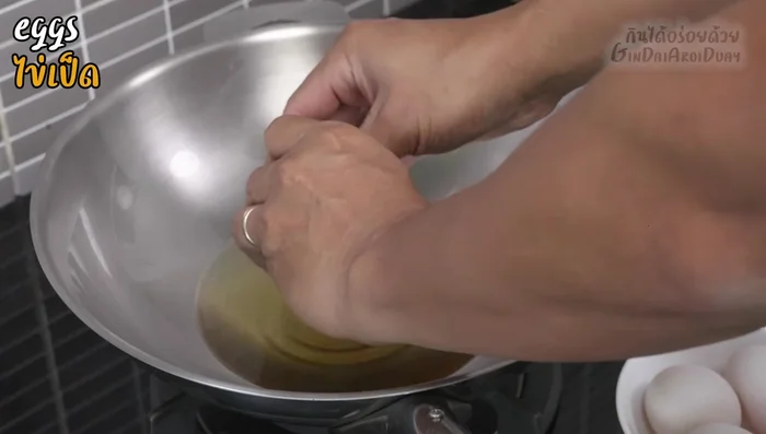 Fry the duck eggs until the whites are crispy and the yolks are still slightly runny. You can adjust the cooking time to your preference for yolk consistency.