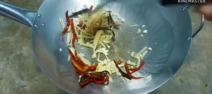 Add young ginger and stir-fry until tender.