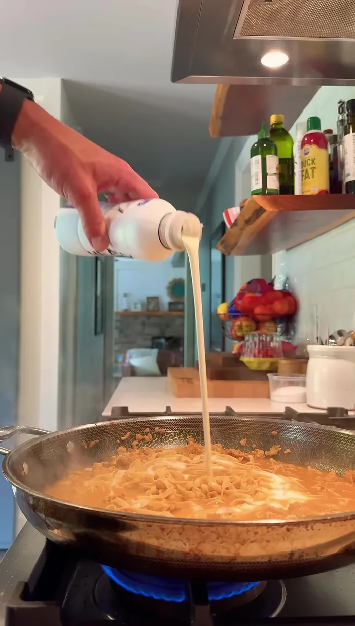 Add coconut milk or heavy cream (as desired).