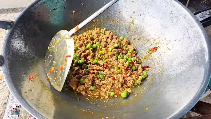 Stir-fry until the eggplant is cooked. Do not overcook.