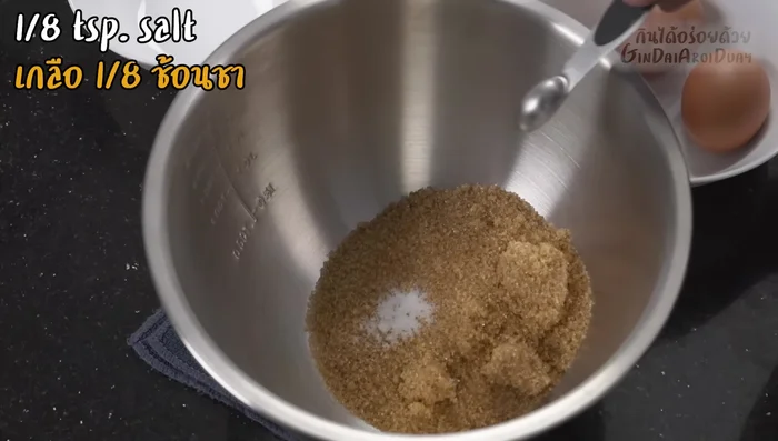 In a separate bowl, whisk together sugar, salt, and eggs until well combined and the sugar begins to dissolve.