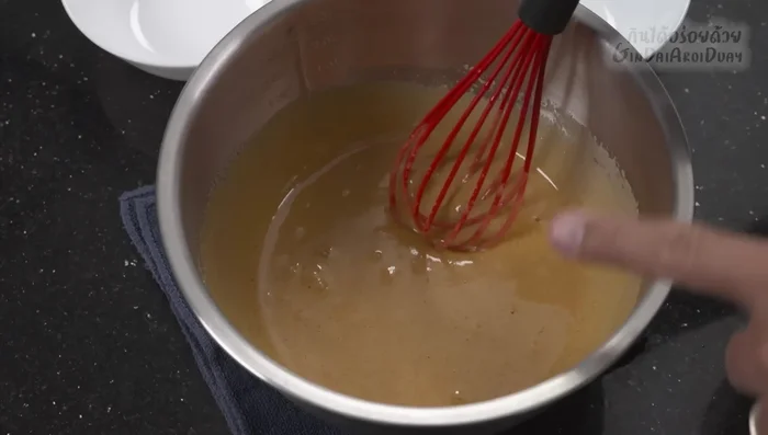 Add vanilla extract to the egg mixture and stir well.