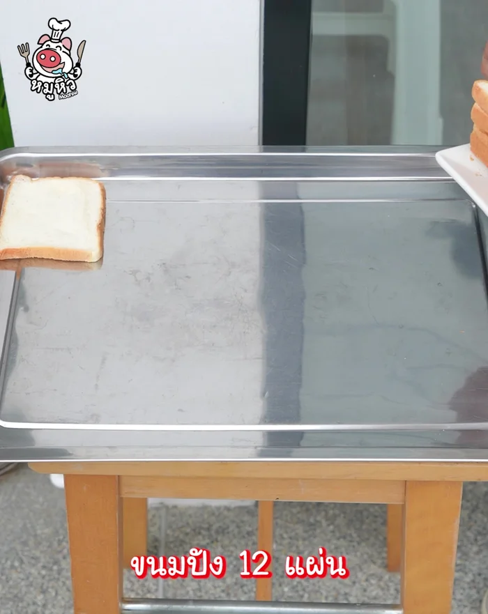 Arrange bread slices on a big tray and sun-dry them.