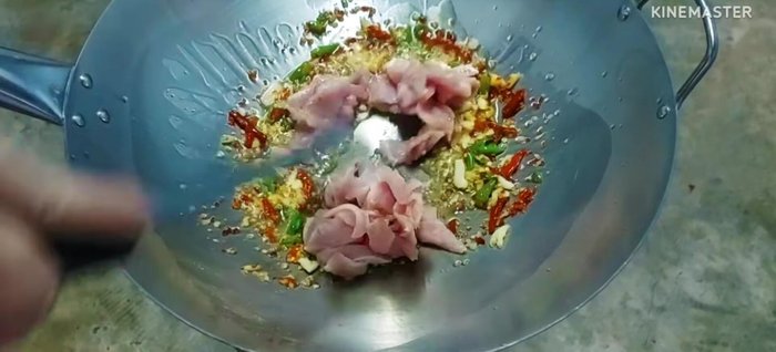 Add the pork and stir-fry until cooked. Use medium heat to prevent the chilies from drying out.