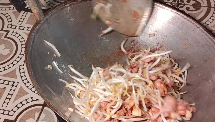 Season with soy sauce, oyster sauce, sugar, and pepper to taste. Stir-fry for another minute to combine the flavors.