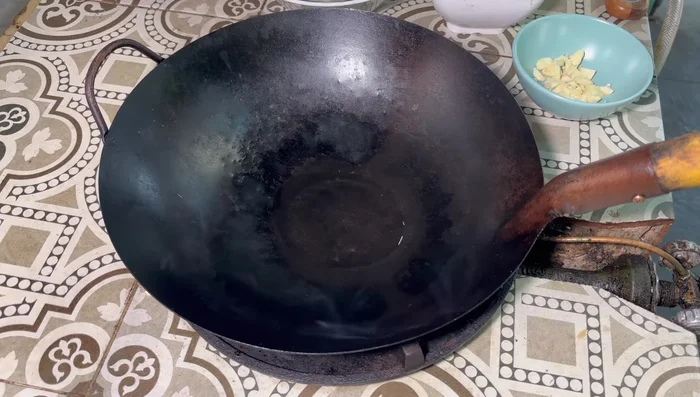 Heat coconut oil in a pan over medium heat.