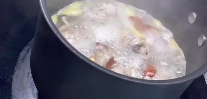 Add coconut milk and bring to a boil.