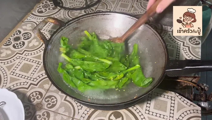 Remove the kale and immediately plunge it into ice water to keep it crunchy and bright green.