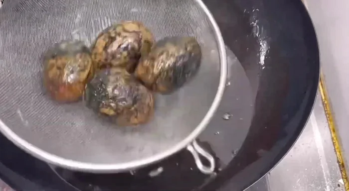 Heat cooking oil in a frying pan.