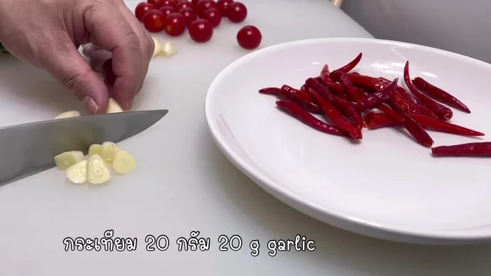 Prepare the Jaew Pla Ra (Thai Spicy Fish Dip). This is likely the most involved part, and the transcript doesn't detail the process.