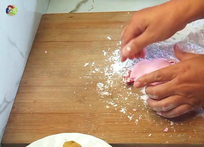 Place the wrapped dough into the molds, ensuring a nice pattern on the bottom.